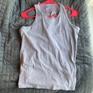 FABLETICS light gray workout top in size small